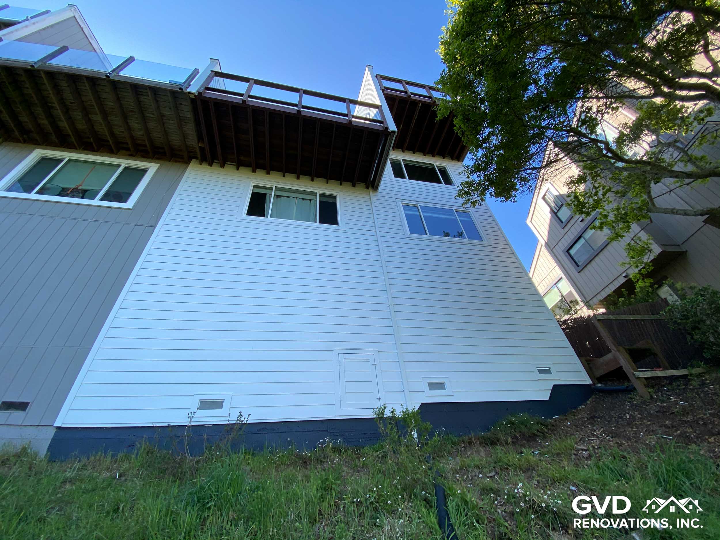 James Hardie Siding Transformation, Shed Installation, Deck & Railings Upgrade