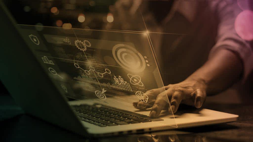 Abstract image showing a hand on a laptop keyboard on Join The Conversation On Linkedin With Fitch