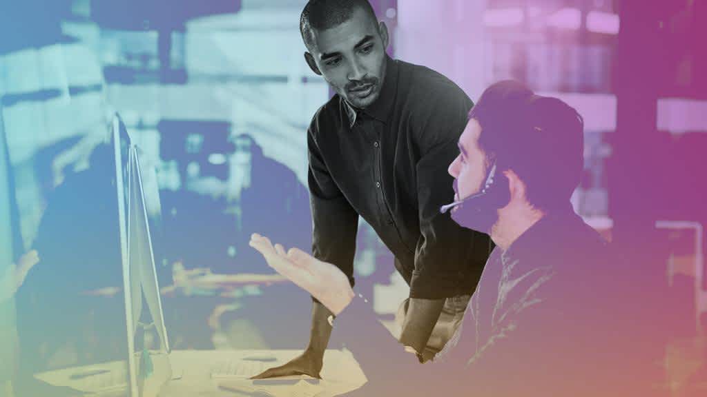 Two male colleagues talking on Software Engineering