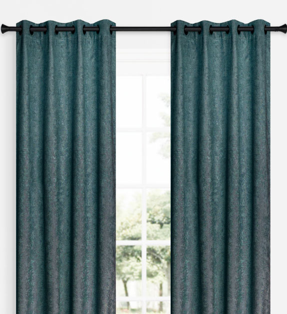 A dark green curtain panels covering a window. 