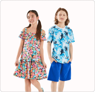 A girl wearing a floral print dress and the boy beside is wearing a blue camo t-shirt with blue shorts
