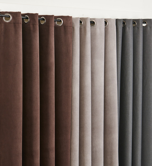 Dark brown curtain panel, light grey curtain panel and a dark grey curtain panel.