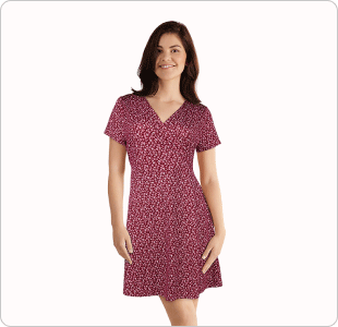 woman model wearing a pink floral skater dress