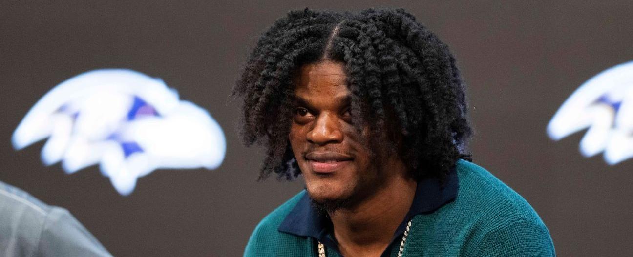 Lamar Jackson not yet at Ravens workouts after signing deal