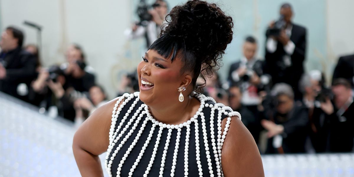 Lizzo Drips in Pearls at the 2023 Met Gala After Critiquing Last Year’s Red Carpet