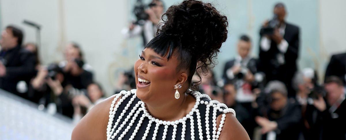 Lizzo Drips in Pearls at the 2023 Met Gala After Critiquing Last Year’s Red Carpet