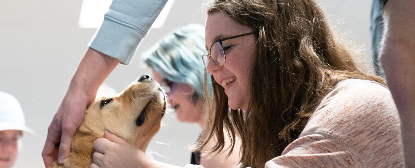 Washburn Rural therapy dogs Sugar and Mordecai give love and care
