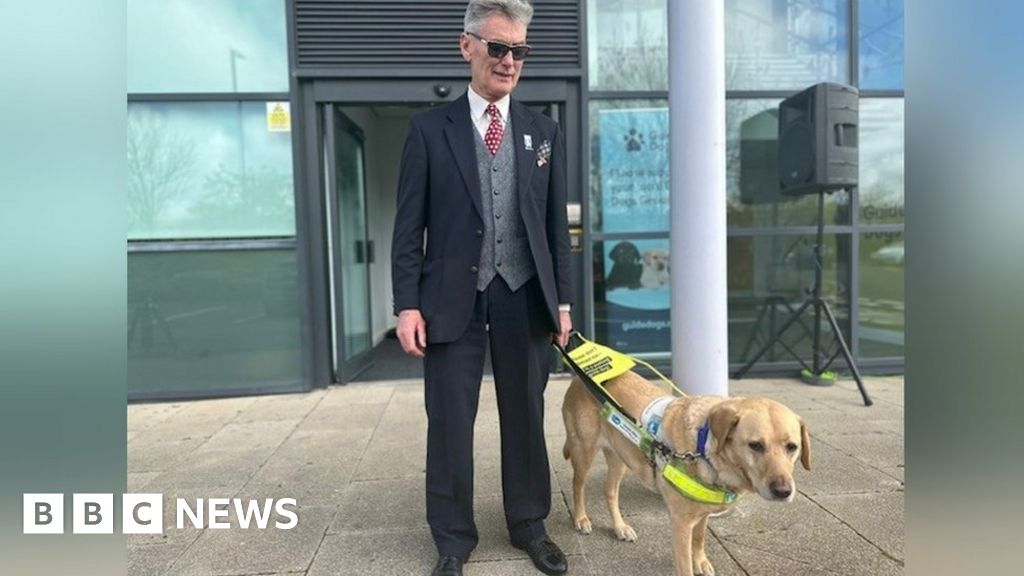 Blind ex-England footballer Dave Thomas opens Newcastle guide dogs centre