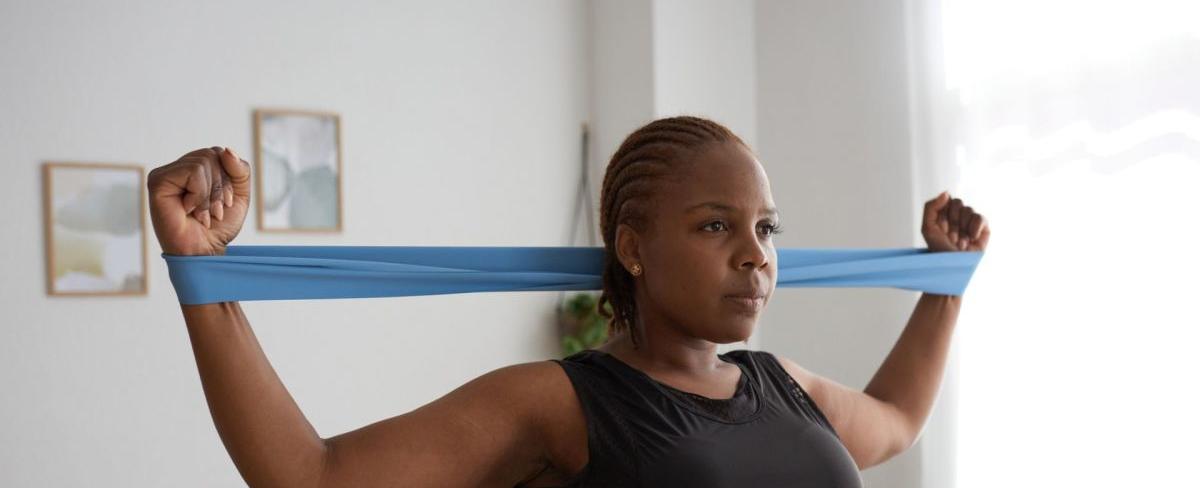 All you need is a resistance band and these four exercises to strengthen your back without weights