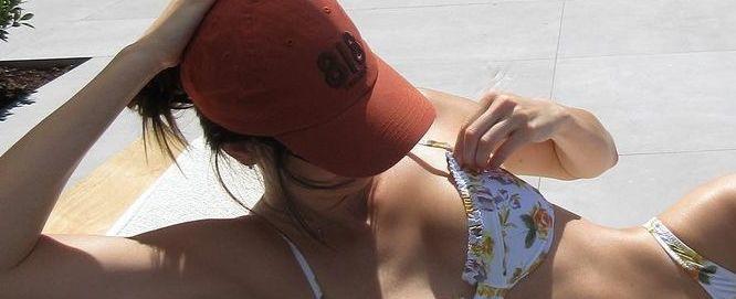 Kendall Jenner Casually Poses in Floral Thong Bikini