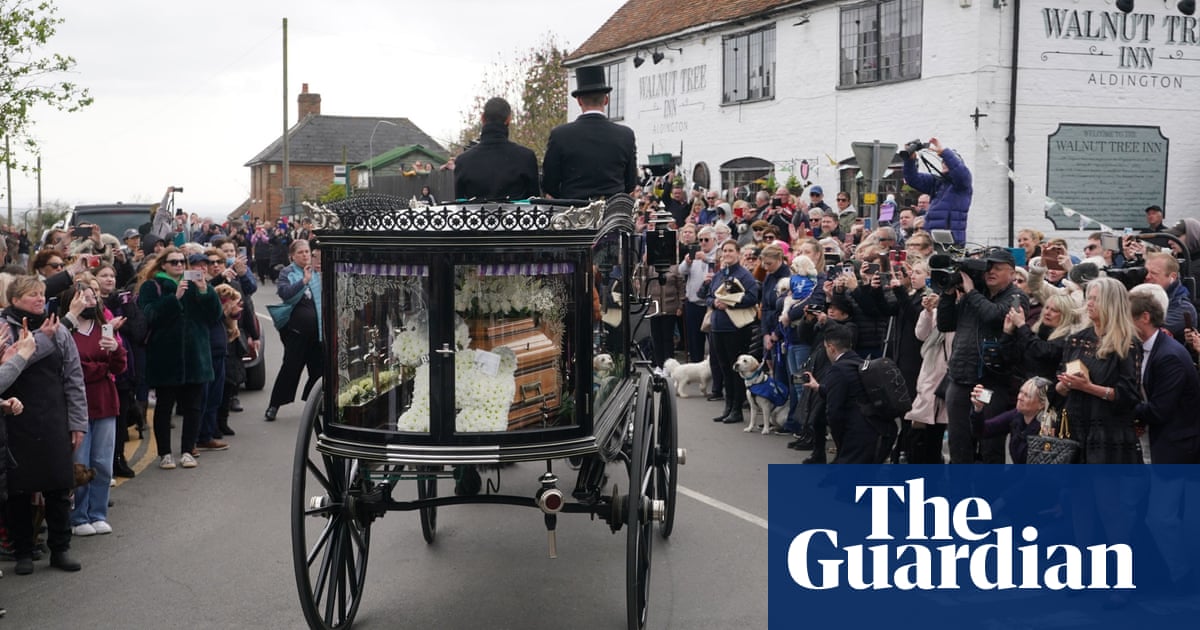 Dogs and mourners line streets to say goodbye to Paul O’Grady
