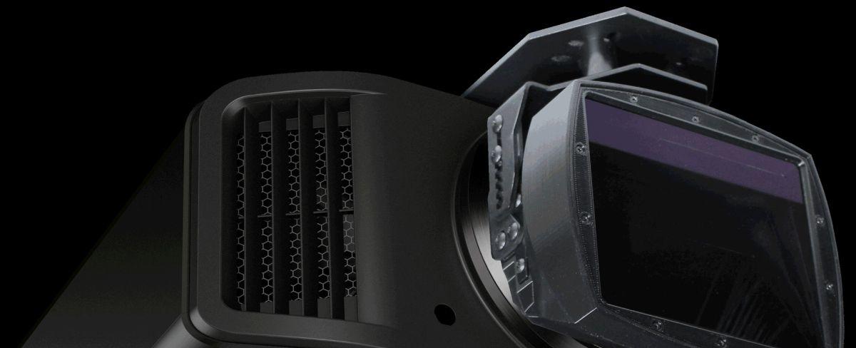 Here’s one way to get rid of black bars in ultra-wide movies: use a projector