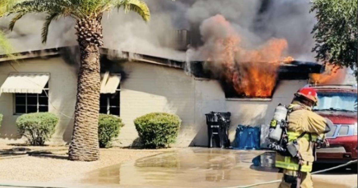 Eleven people, six dogs displaced after house fire in central Phoenix