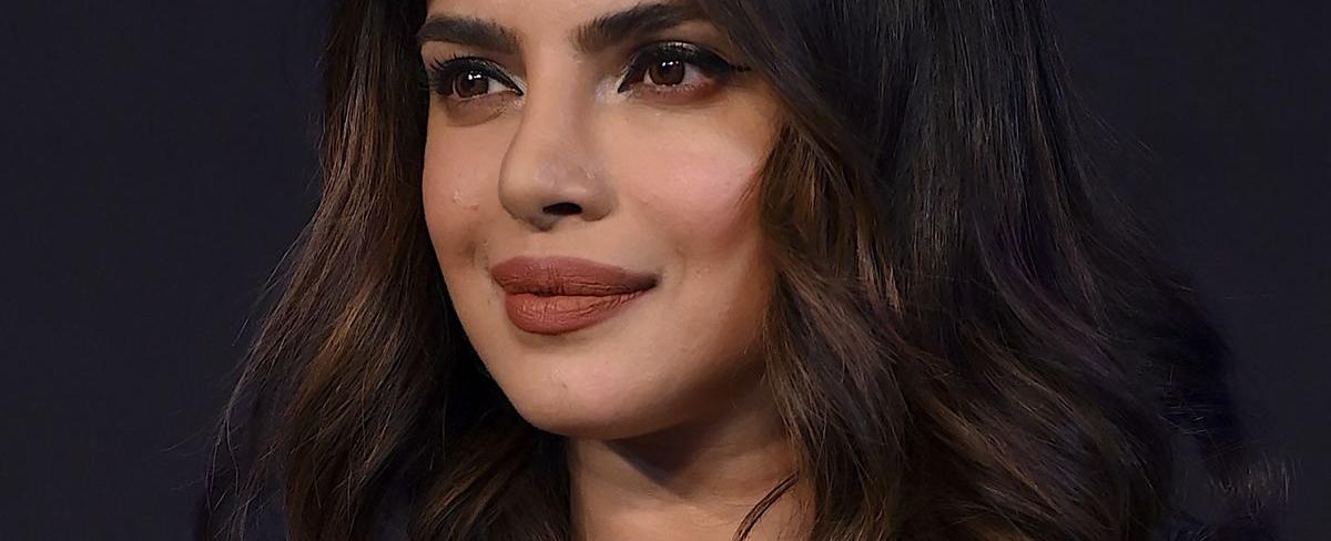 Priyanka Chopra Wore Gold Plunge Bodycon Dress to Promote Citadel in Mumbai