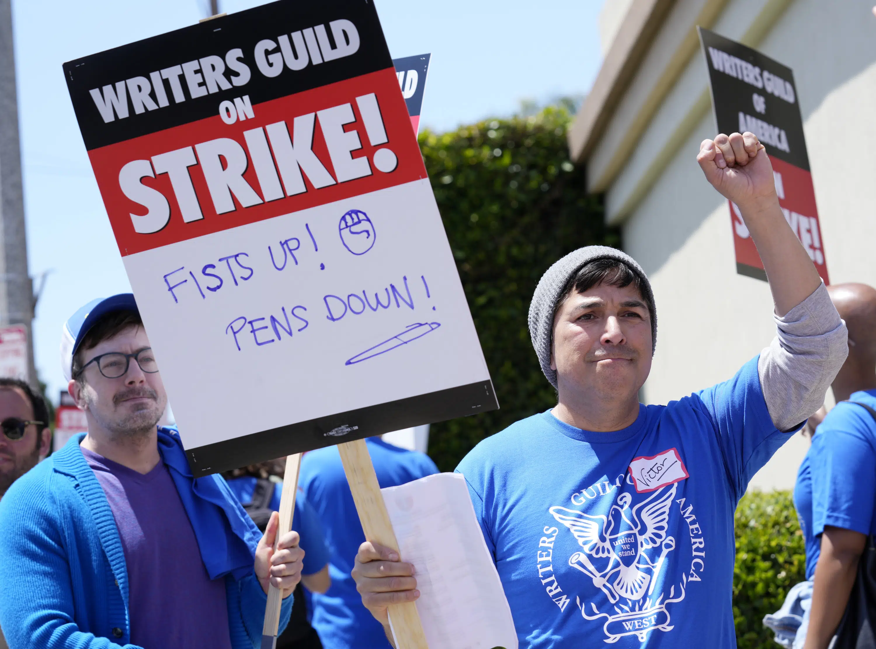 Late-night TV shows go dark as writers strike for better pay