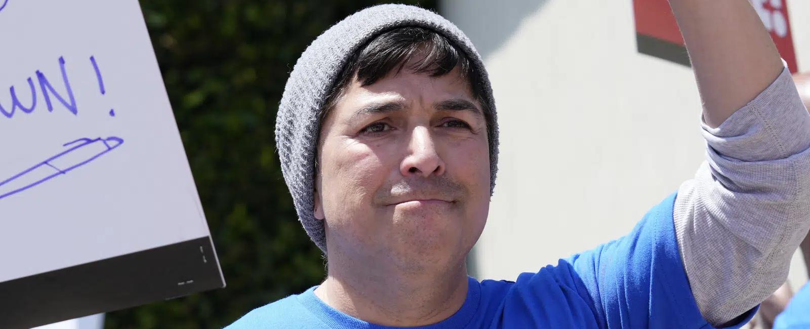 Late-night TV shows go dark as writers strike for better pay