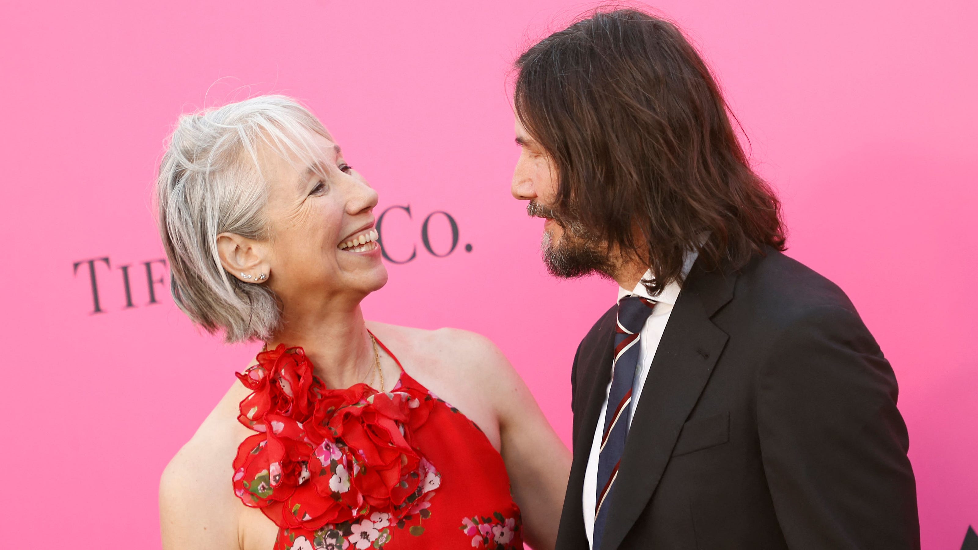 Keanu Reeves, Alexandra Grant share kiss on red carpet: See the photo