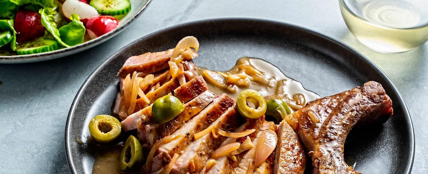 This pork chop recipe features the flavors of a dirty martini