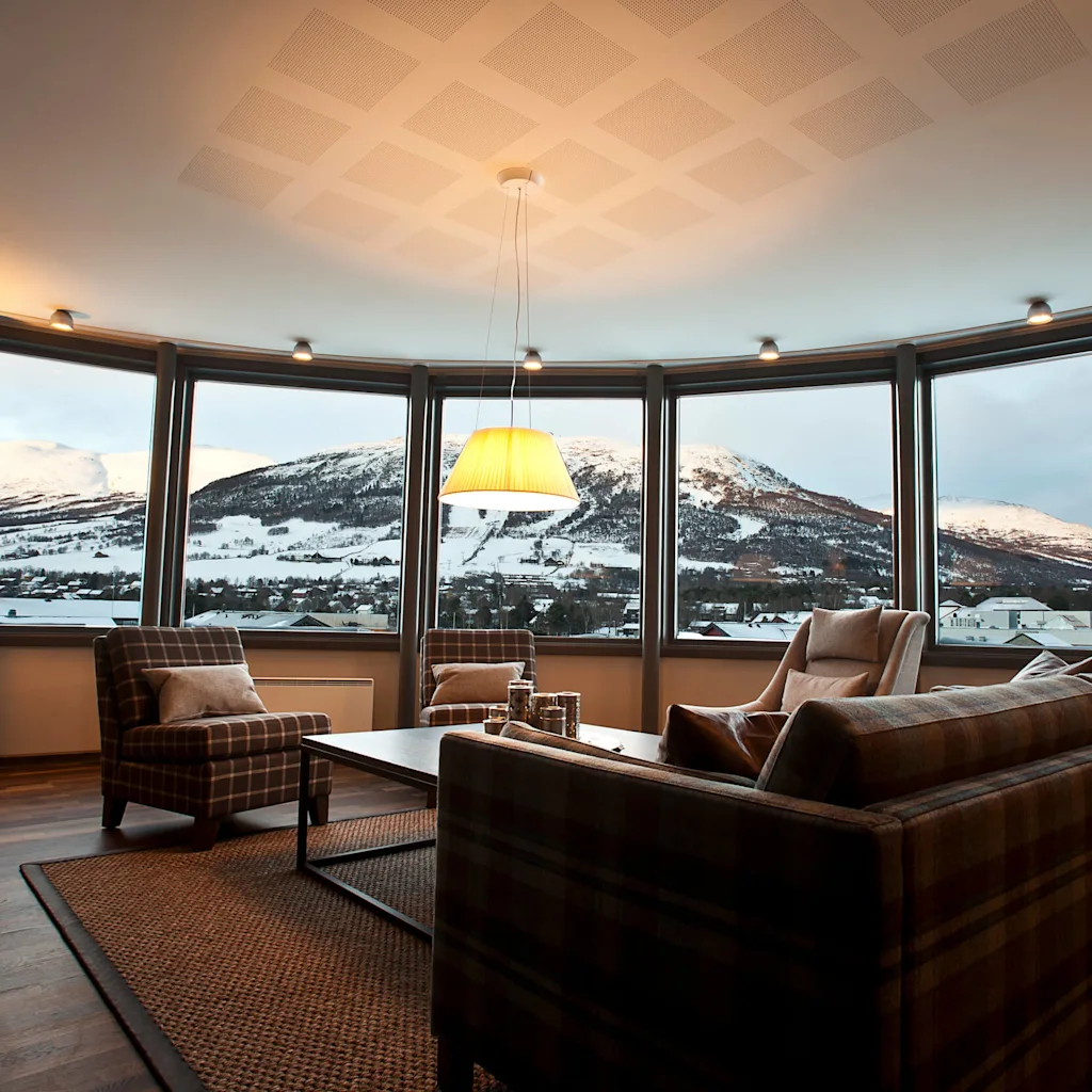 View of the snowy mountain side from a suite at Quality Hotel Skifer in the mountin town of Oppdal in Norway.