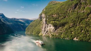 Geiranger fjord and Hurtigruten ship passing_16_9