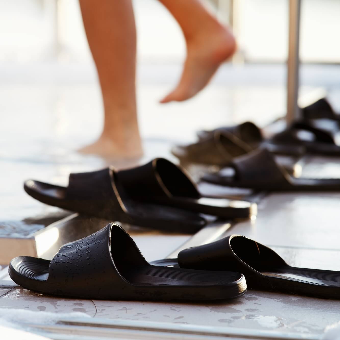 Slippers by the pool at spa hotell.