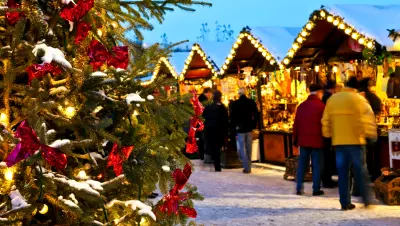 christmas-tree-outside-people-shopping-market.jpg