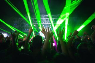 raised-hands-and-lazers-in-nightclub-party