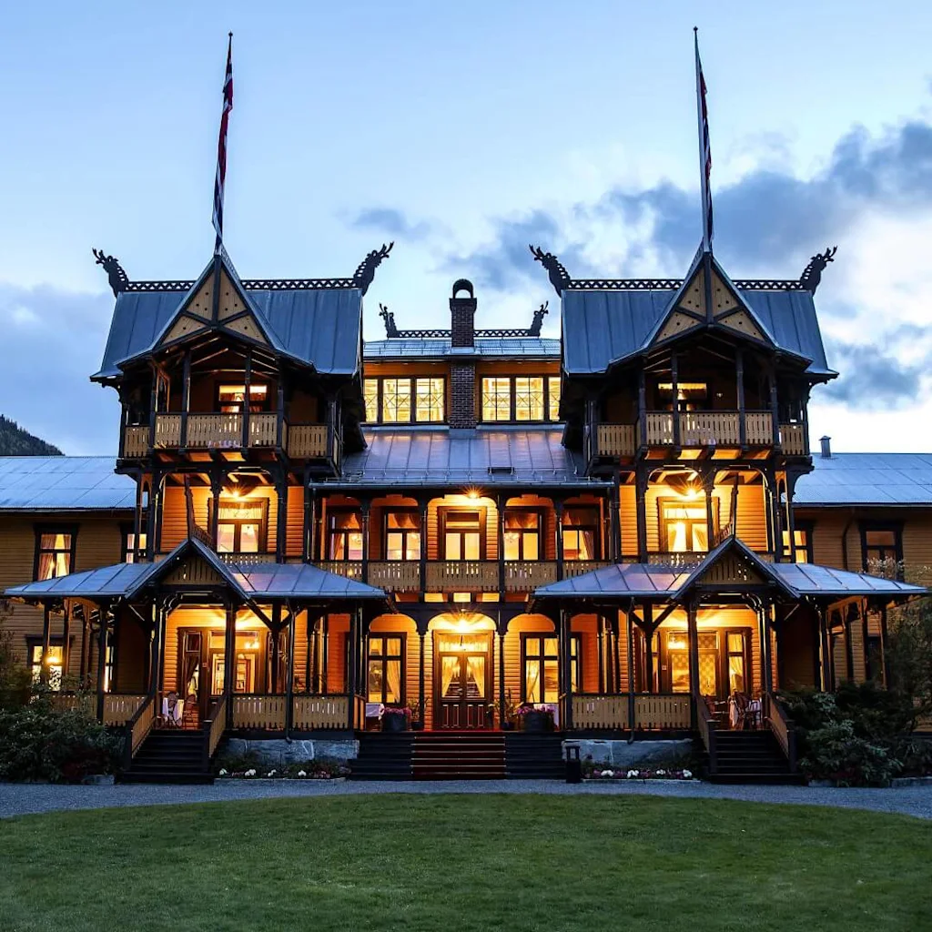 Facade of Dalen Hotel during an evening in Dalen, Norway.