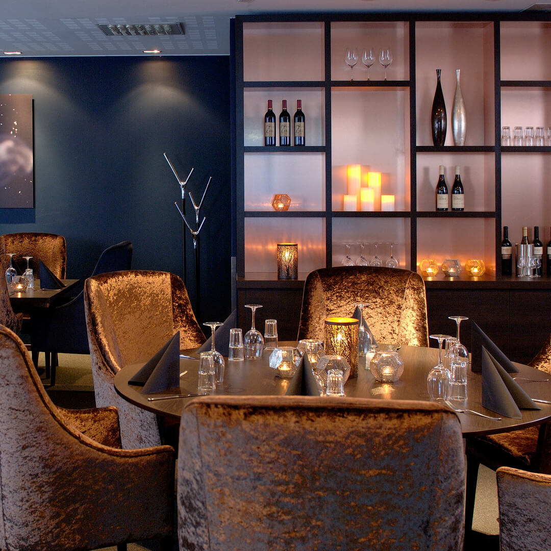 Tables and chairs at restaurant Maritimus at Strömstad Spa.