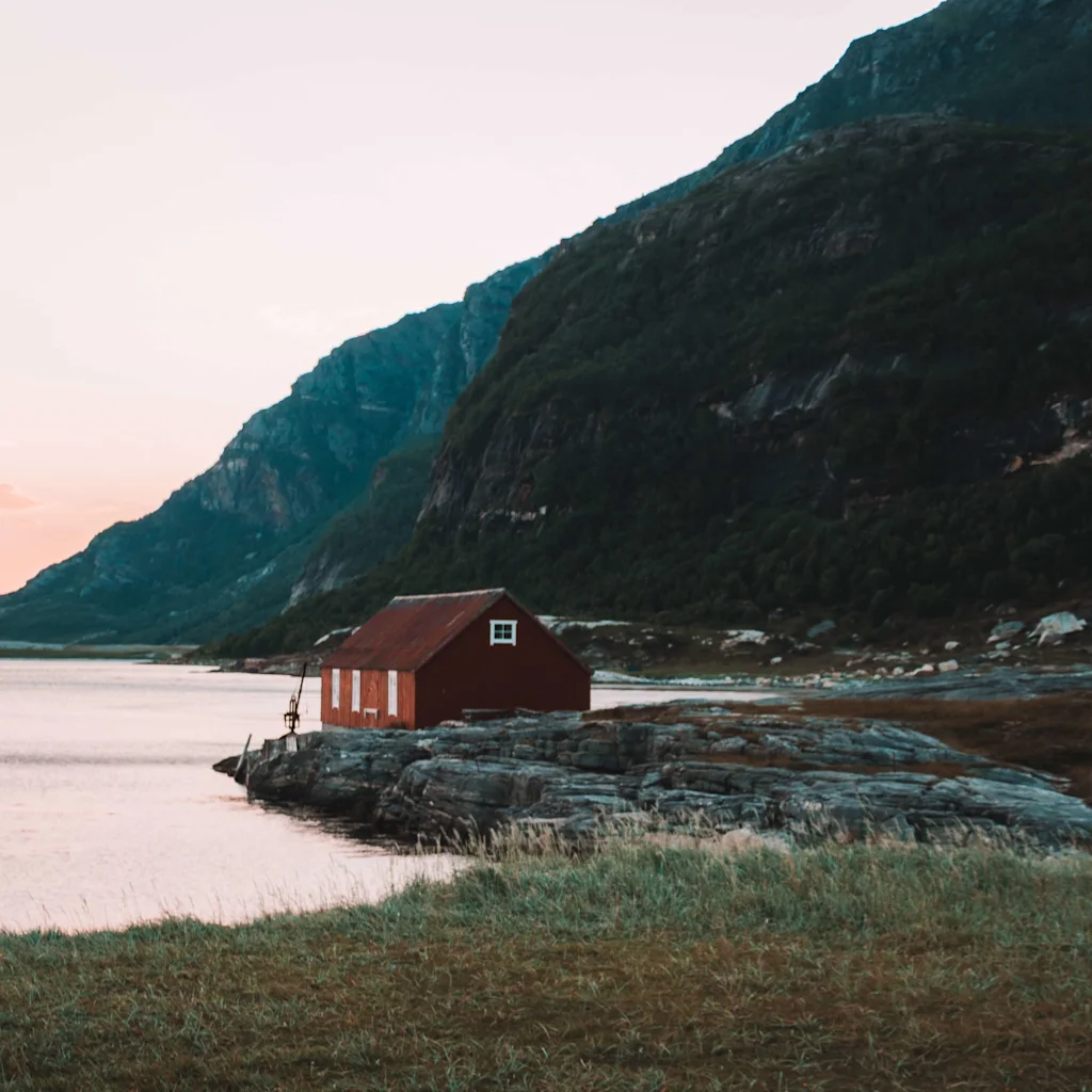 Little red cabin by the ocean outside Bodø.