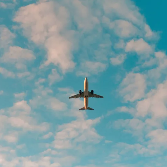 Airplane in the blue sky.