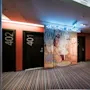 Doors numbered 402, 401, and 419 line the hallway. A mural depicts people and text: “Music makes the rules... THE DANCING QUEEN.” Neon sign overhead displays "<416-401, 417-420>."