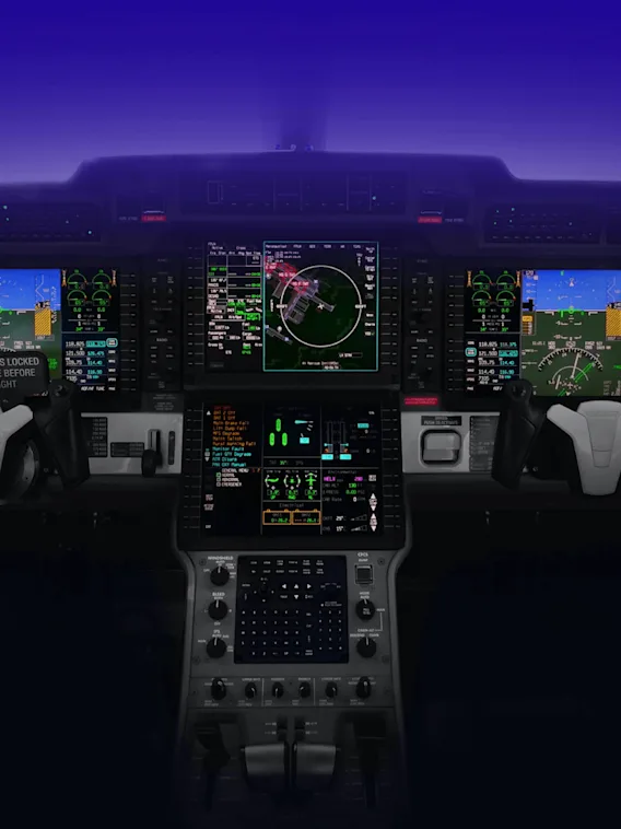 En detaljerad flygplanscockpit med flera digitalskärmar som visar flygdata, omgiven av olika kontroller och instrument. Texten lyder "CONTROLS LOCKED REMOVE BEFORE FLIGHT."