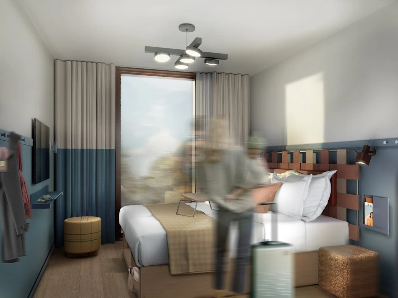 A person placing items on a bed in a modern hotel room with minimalistic decor, featuring a large window, teal and beige accents, wall-mounted TV, and overhead lighting.