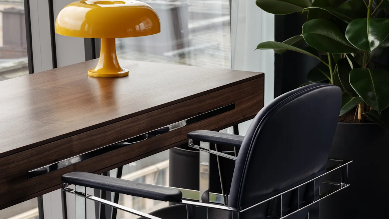 Clarion Hotel® Sign - Stratum Suites by Bernadotte and Kylberg - Stratum Collection desk and chair. Modern workspace with city view.
