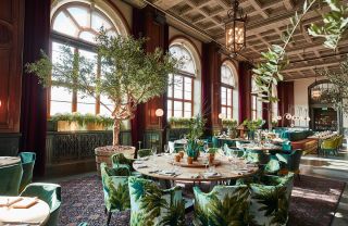 Round table and tree at Norda Clarion Hotel Post