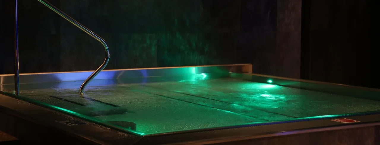 Warm pool in a green light at Obie Spa at Clarion Hotel Draken in Gothenburg.