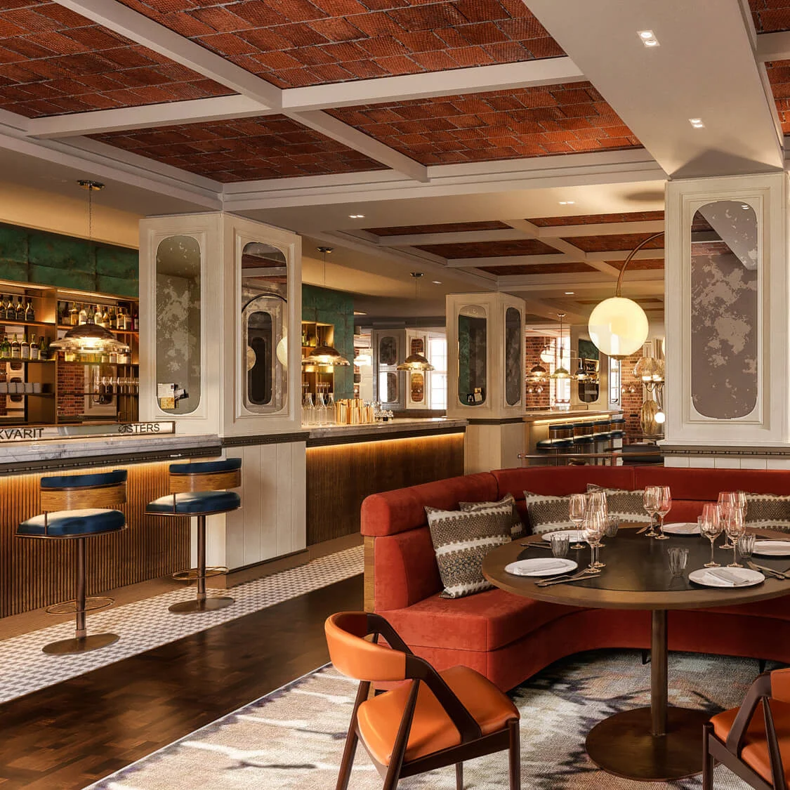 A round table set with glasses and plates rests in a stylish restaurant, featuring warm lighting and elegant decor. The room includes a bar, upholstered seating, and exposed brick walls.