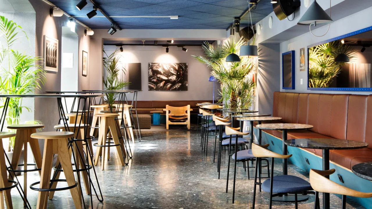 Indoor seating area at restaurant Rodins in Oslo.