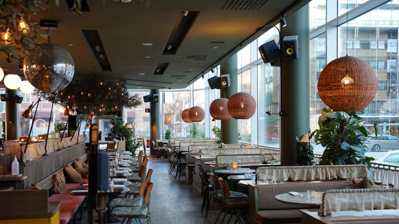 Tables and chairs at Guilty Pleasure Café in Umeå, at Clarion Hotel Winn. 