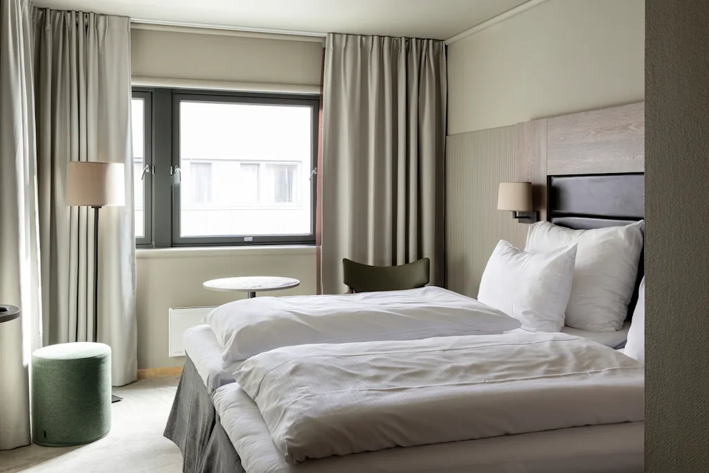 Hotel room. Twin bed. Light room.