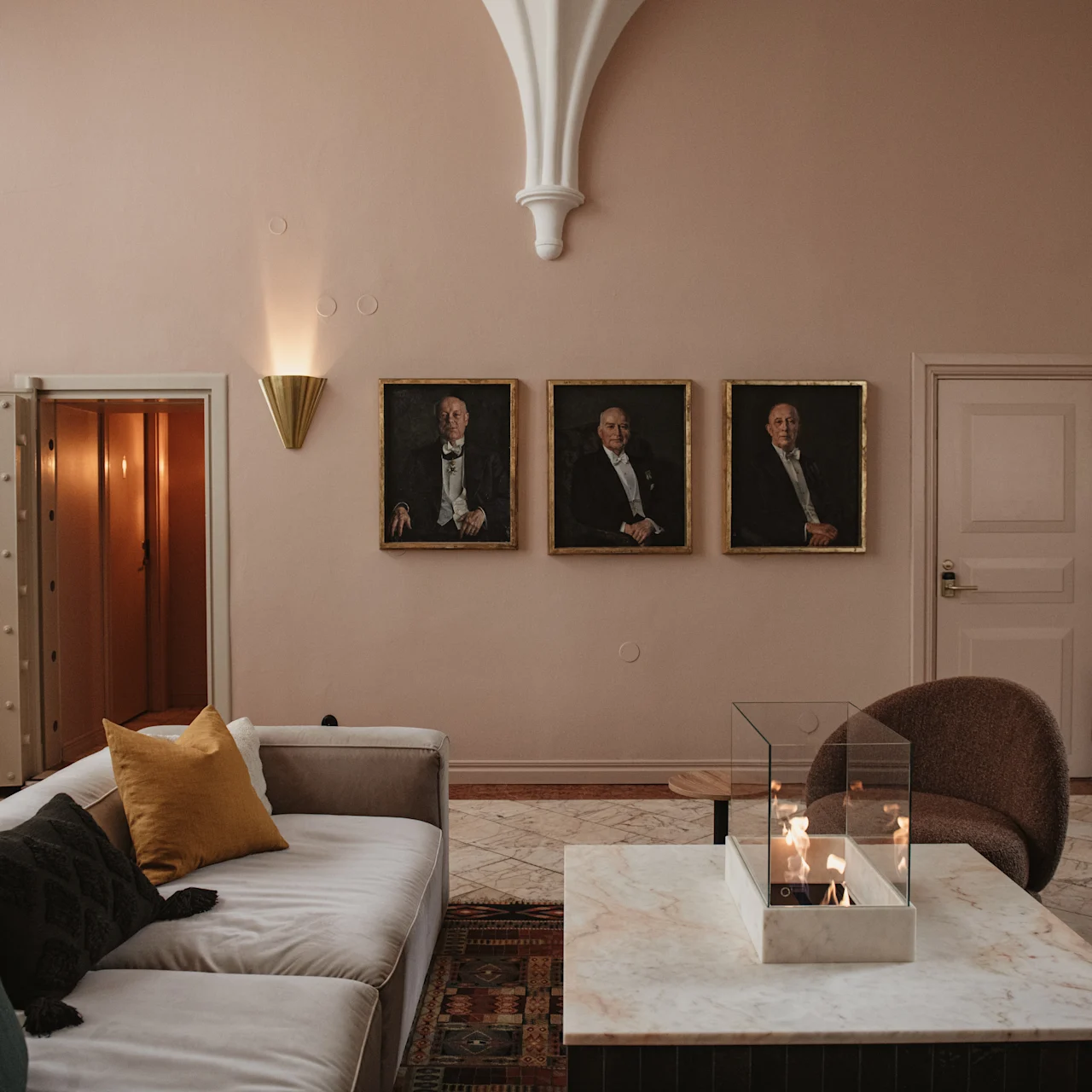 Lobby at a hotel with a beige sofa