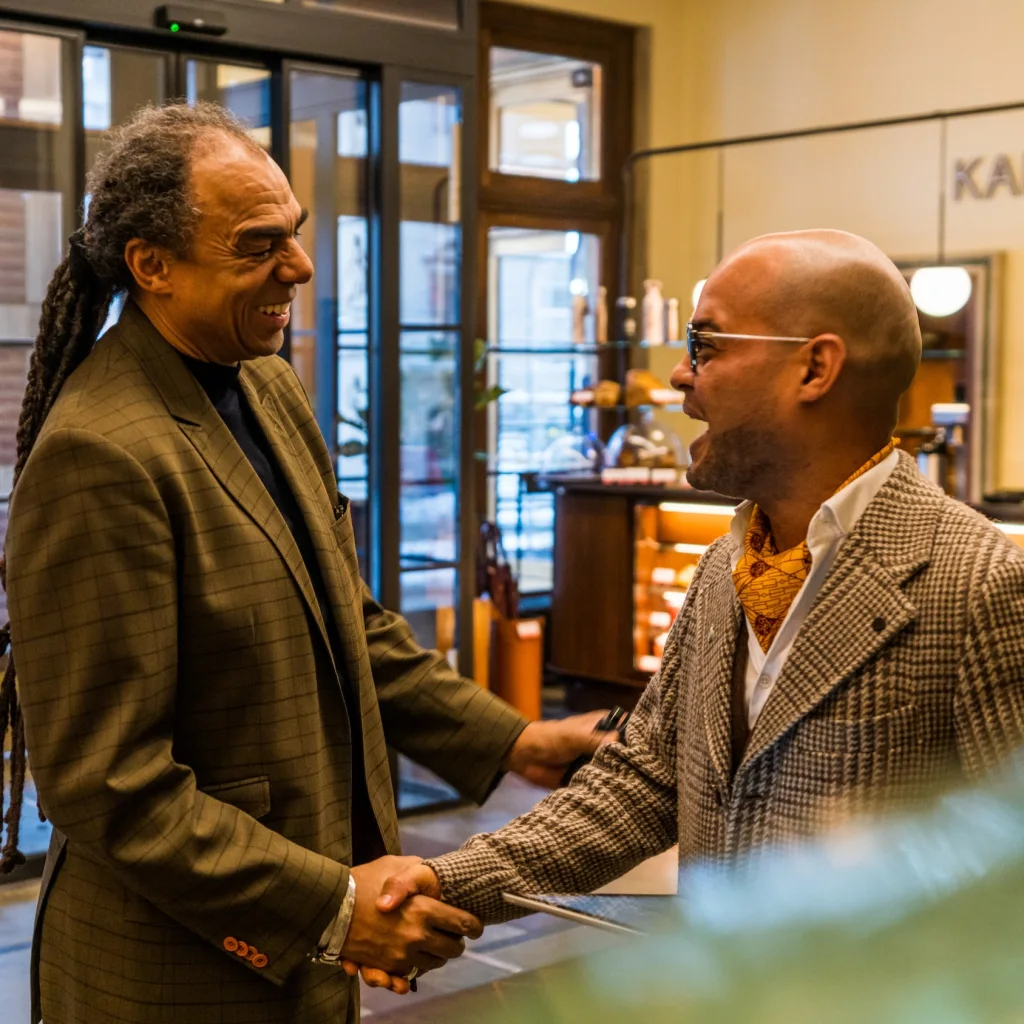 Dominic Gorham greeting a guest in the lobby at Sommerro, a hotel in Oslo.