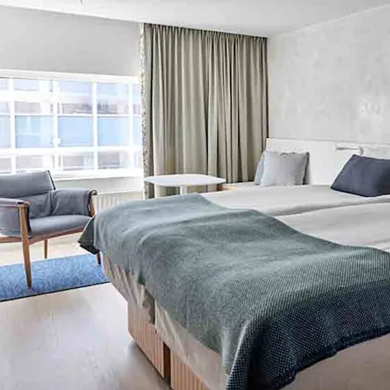 superior-double-bed-nordic-light-hotel