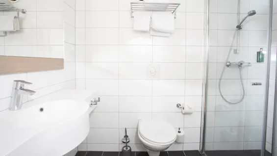 Bathroom at Home Hotel Bryggeparken, shower