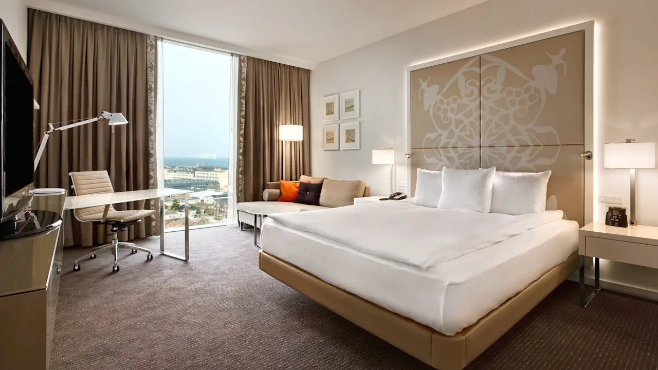 Bed at a Deluxe king room at Clarion Hotel Copenhagen Airport at Kastrup in Denmark.