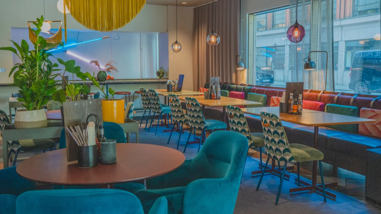 Interior with tables and seats at The Social The Mill, Bar & Bistro.