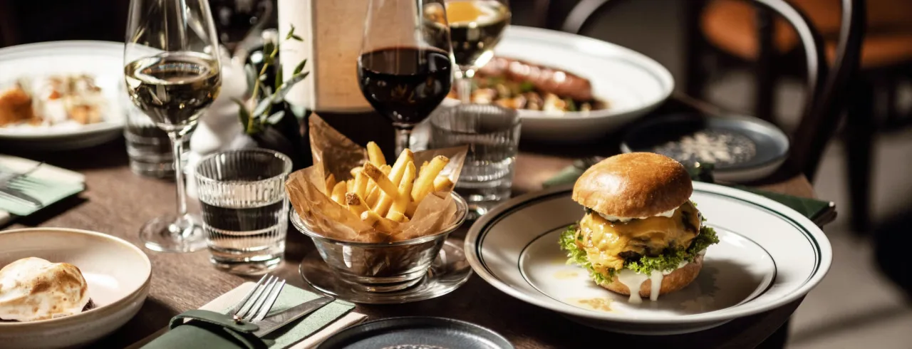 Hamburgers and fries being served at restaurant NOR in Sundsvall.