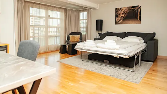 Deluxeroom with made sofabed at Home Hotel Bryggeparken.