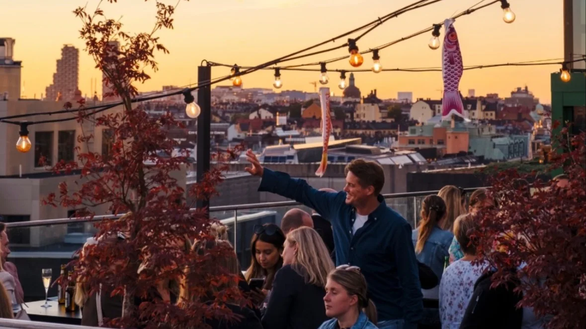 TAK rooftop during sunset in Stockholm.